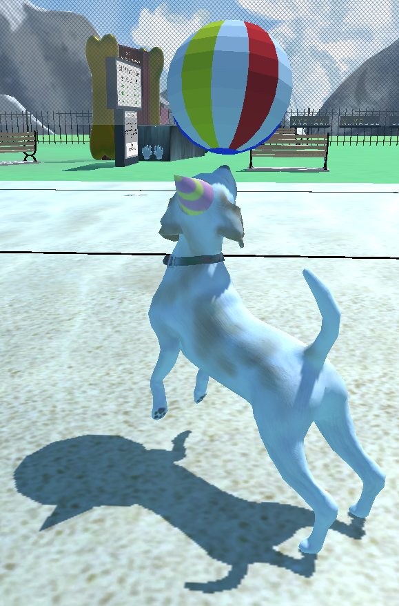 A dog playing volleyball with a beach balloon.